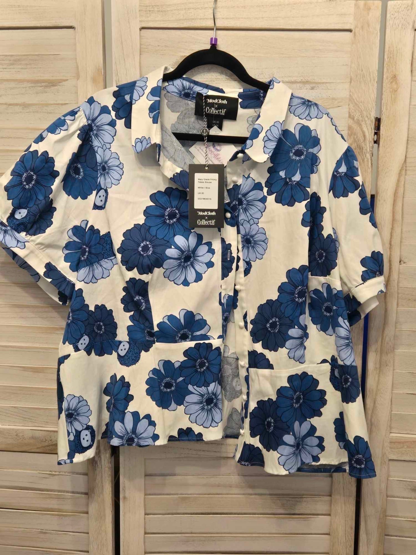 ModCloth x Collectif Collared Daisy Peplum Hem Blouse